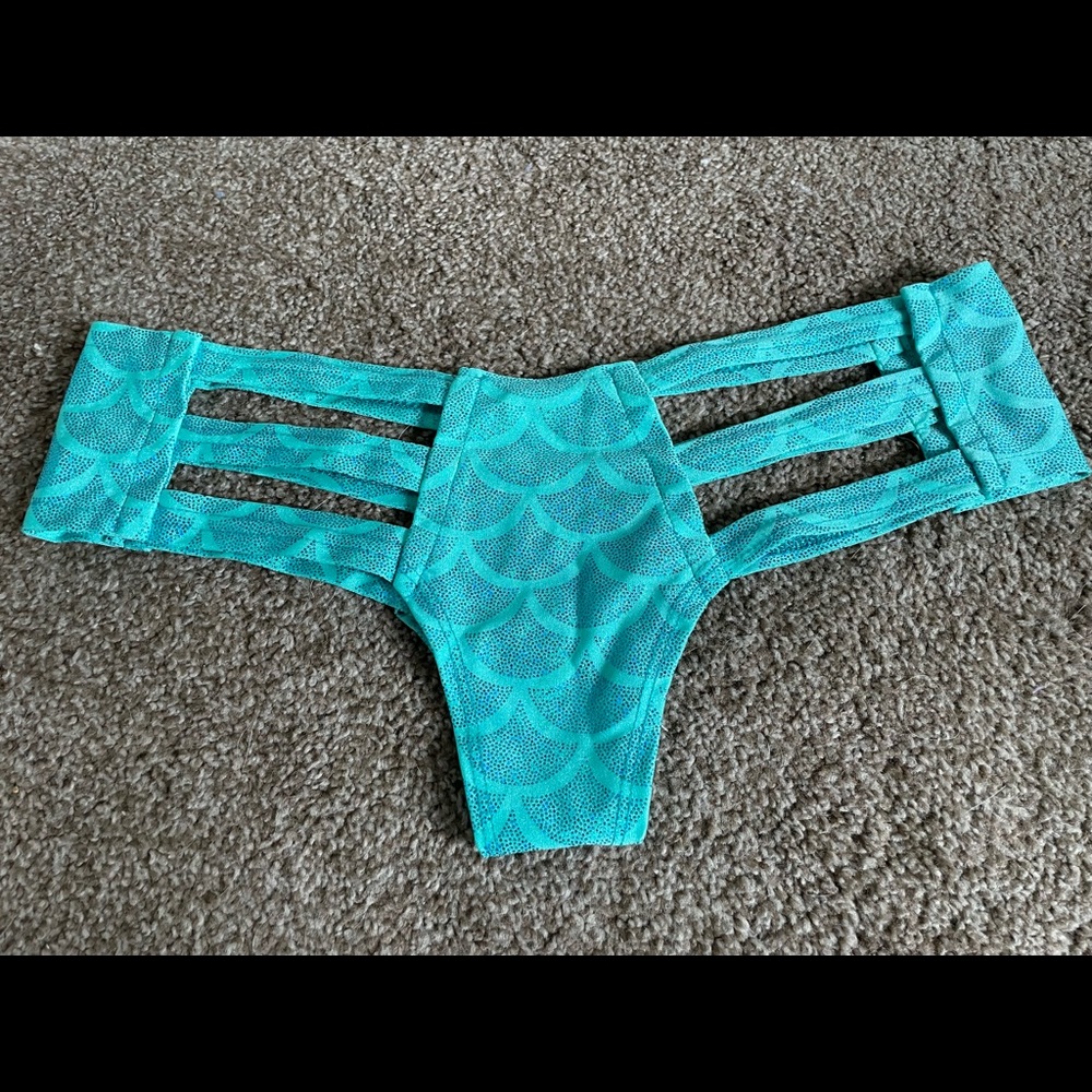 Light blue caged rave bottoms